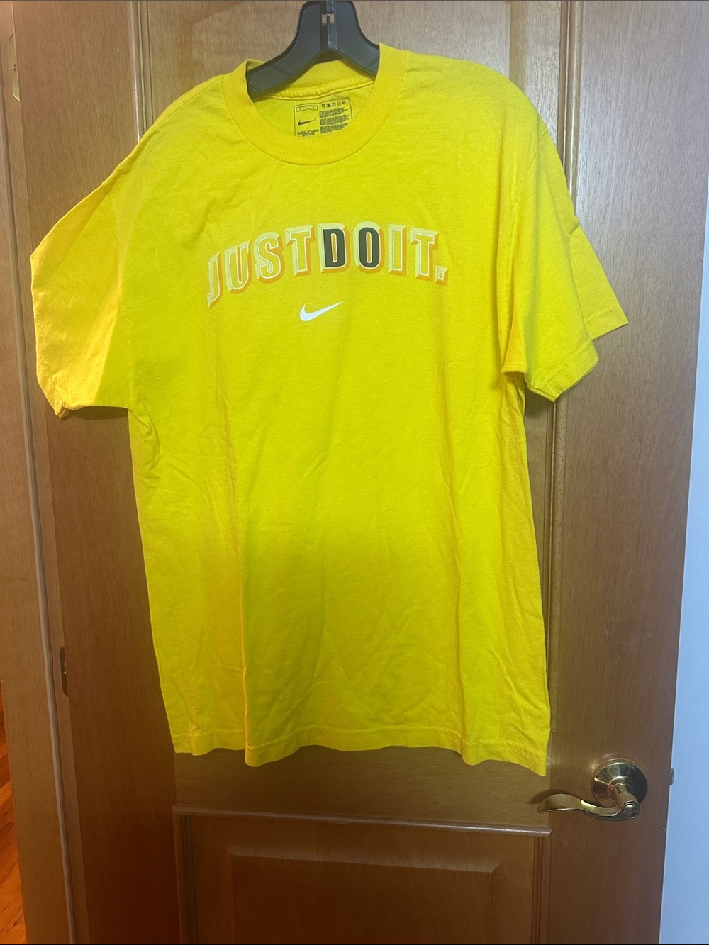 Nike Men's Yellow 'Just Do It' Graphic Tee with White Swoosh